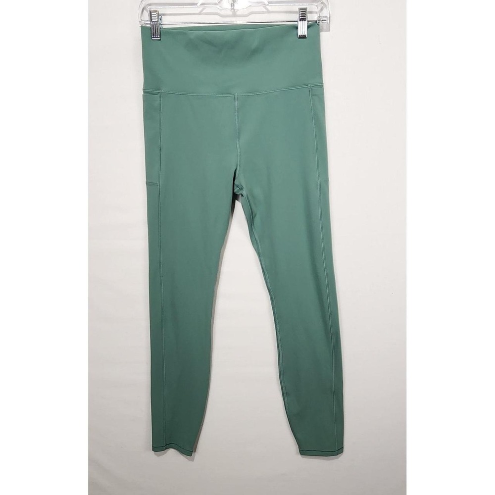 Vuori Women's Size M Green High Rise Performance Leggings Side Pockets Yoga